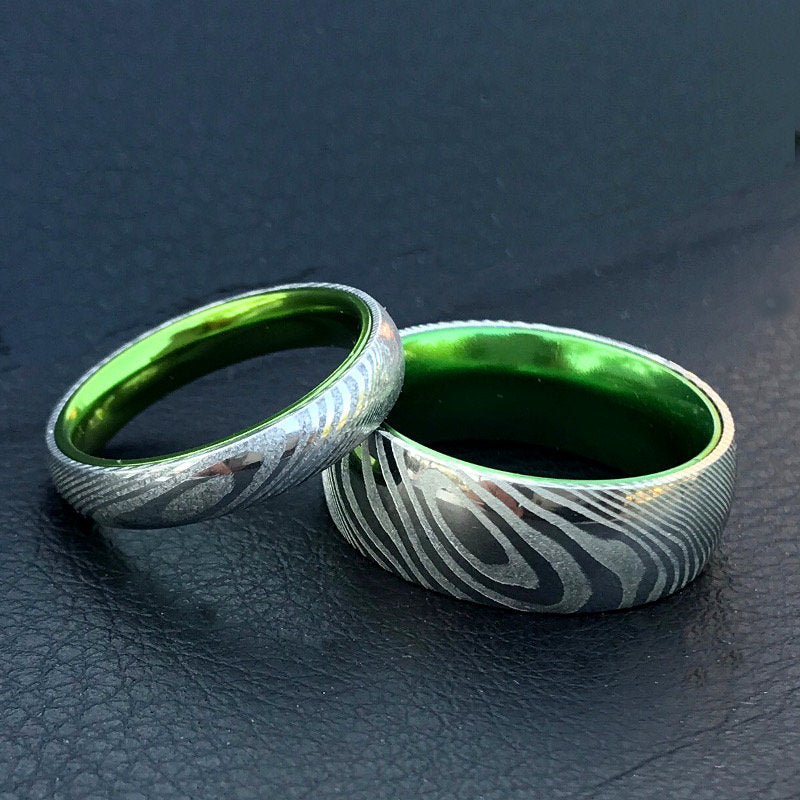 Emerald Forge Damascus Collection - Green Damascus Steel Ring Set | His and Her Damascus Steel Wedding Rings